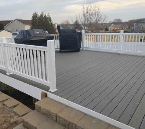 Americas Fence & Deck Company - Warrenton, MO. tembertec deck with vinyl hand rail install in Warrenton Mo 63383