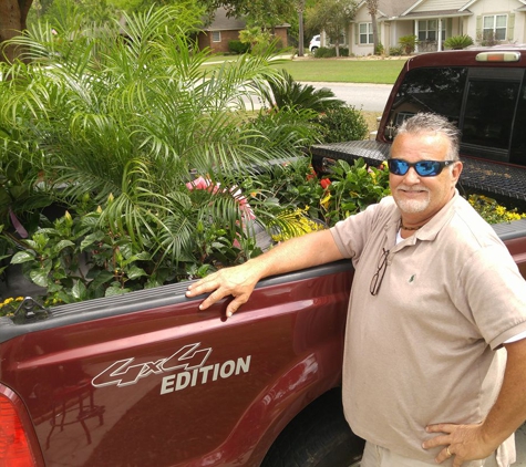 Another Landscape Company - Brunswick, GA. Owner, Terry Loper with a load of plants