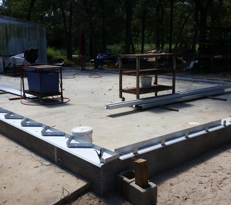 R.O.C. Concrete Contractor - Bastrop, TX. first project, no pics of the concrete, but the metal brackets around the edge are sitting on it.