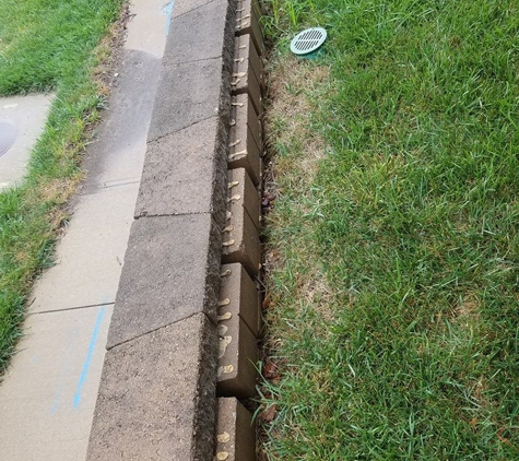 Green Expectations Landscaping Co., Inc. - Kansas City, KS. Definite issue with sinking dirt. Back filled x 1 asked the company to return to assess the wall and for more back fill and no one ever did!