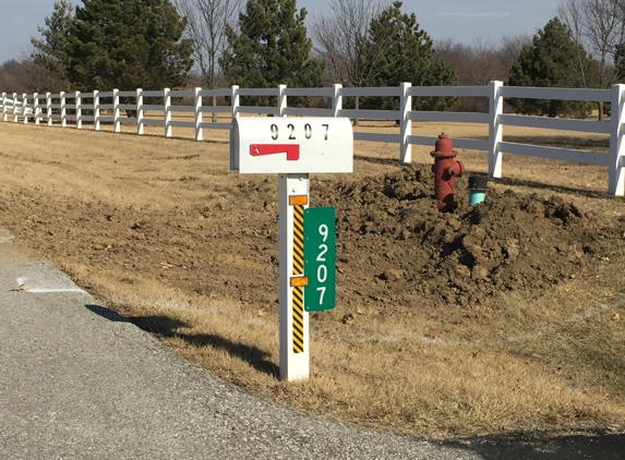 Public Water Supply District - Lees Summit, MO. Why did you install the hydrant facing away from the street? Question from a Old KC firefighter Npa regs says it should face the street!