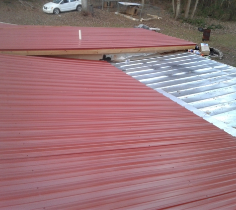 Herbert Shiflett Roofing - Silver Creek, GA. Barn red roof professionally installed by Herbert Shiflett Roofing