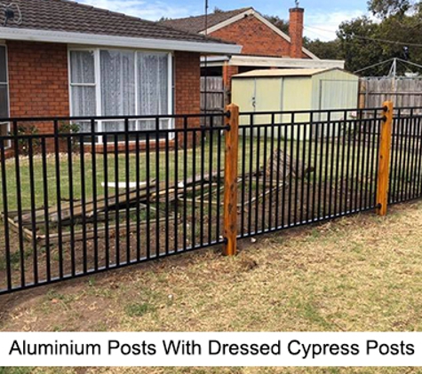 Bruce Carter Fencing. Aluminium Posts With Dressed Cypress Posts