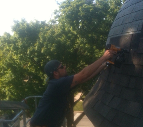 Shenberg Construction - Morris, IL. Shingling a round steeple