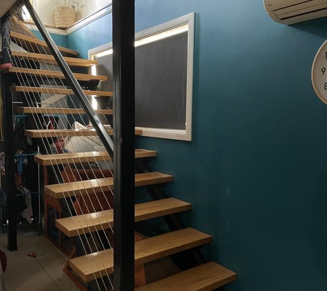 TLM Custom - Swan Creek, NSW. Stair stringers, powder coated rails and stainless steel wires