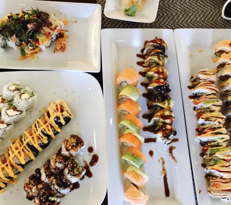 Sushi House - Dallas, TX. From R -->L, White Dragon roll, New York roll, Dragon roll, Alaska roll, Eel roll, Louisiana roll, Philly roll, and lobster roll in left top