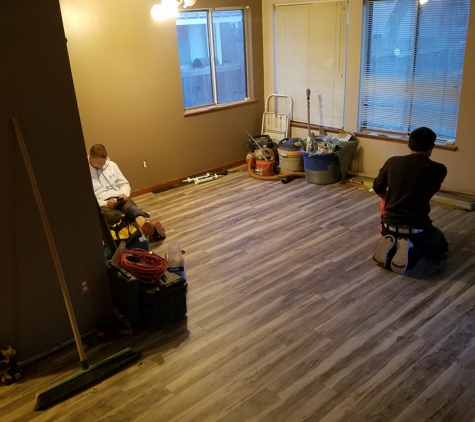 Carpet Wise Inc - Longmont, CO. Here is one installer sitting playing on his phone. A 1-2 day install became 4 days. Go figure!!!