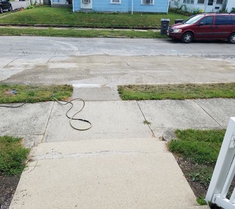 L J De Weese Co Inc - Tipp City, OH. Soot left in front of my house in the street and lawn.