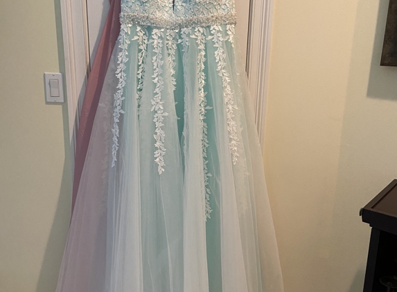 Design Sewing & Alterations - Destin, FL. My 50th Wedding Anniversary gown altered by Ki.