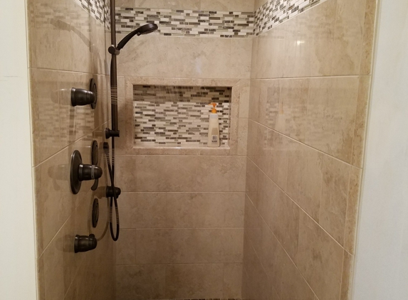 Performance Pro Plumbing Inc. Moen shower system in oil rubbed bronze finish