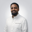 Angesom Berhe - Dental Clinics