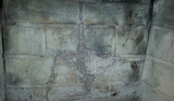 west chimney sweep - Oak Hills, CA. Cracked Brick Panel. BEFORE