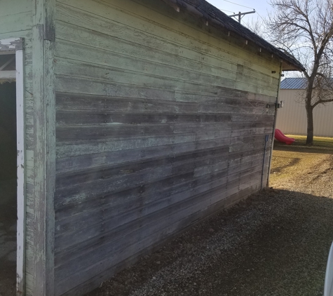 Upbeat Painting - Aberdeen, SD. Before and after pictures of a 2 stall garage that we scraped, washed and hand brushed!