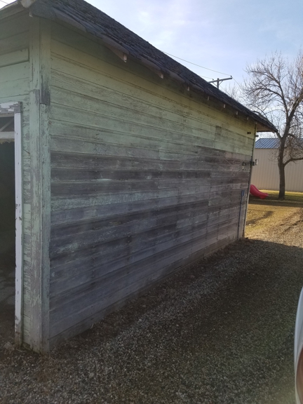 Upbeat Painting - Aberdeen, SD. Before and after pictures of a 2 stall garage that we scraped, washed and hand brushed!