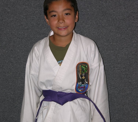 Rocky's Dojo & Gym Inc - Sugar Grove, IL. A karate student at Rocky's Dojo