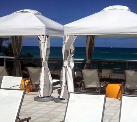 Skys The Limit - Boca Raton, FL. Freestanding cabanas and pavilions lend privacy and class to any resort pool.