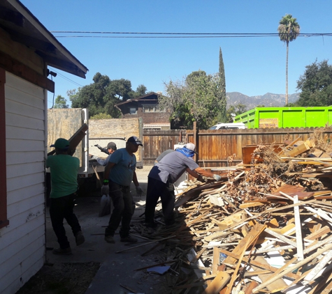 Haul N Go - Los Angeles, CA. Before cleaning the large pail of trash