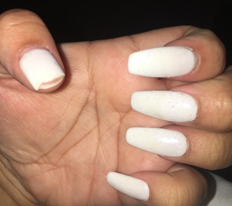 T K Nails - Houston, TX. Same day I got them done this nail broke off.