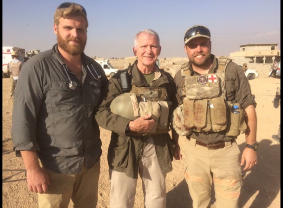 Wommack Monument Co - Bolivar, MO. My son Derek (right) with CoL. Oliver North in Mosal Iraq