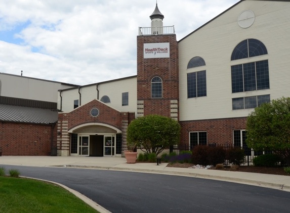 Health Track Sports Wellness - Glen Ellyn, IL. Beautiful building with a lobby for members to watch television, check email, and enjoy a treat from the snack bar.