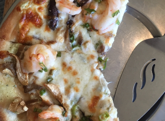 Caf Pesto - Kamuela, HI. Chili grilled shrimp pizza...  Quite yummy.