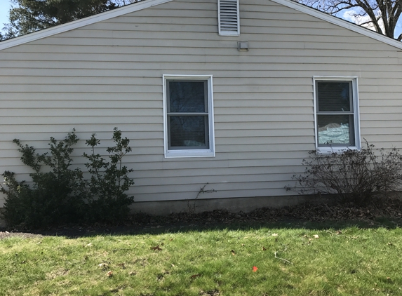 Simpson Siding Co - Milford, CT. After pic & looks brand new above the windows the siding had com off  completely