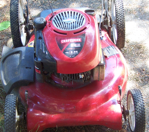 Doug's Small Engine Repair Inc - Hoquiam, WA. Not an "old" mower!