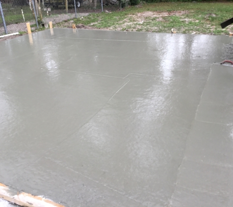 Sanderson Concrete Construction - New Smyrna Beach, FL. To start to smooth out