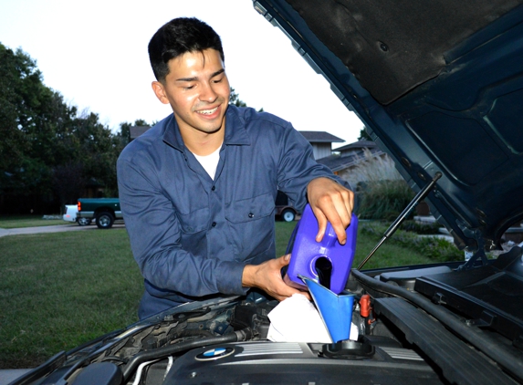 Mobile Car Tune - Wichita, KS. Servicing a customer at his home