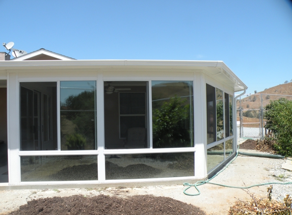 LS England Designs-Four Seasons - Bakersfield, CA. Sunroom enclosures in Bakersfield, California.  Contractors who install enclosures for your home.  Professional Home remodeling contractors.