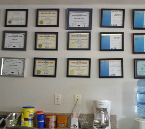 Cenco Auto Body Inc - Arcadia, CA. Wall of certificates from certification and training.