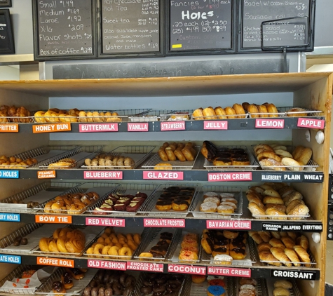 The Donut Shop - Bloomingdale, GA. Rebecca and Bill Lewis of Vero Beach, Florida, making a donut run at The Donut Shop Bloomingdale in Bloomingdale, Georgia.