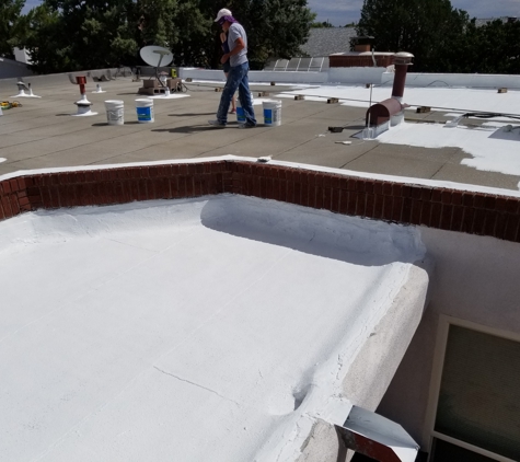 Blue Sky Roofing - Los Ranchos, NM. A silicone restoration we have done