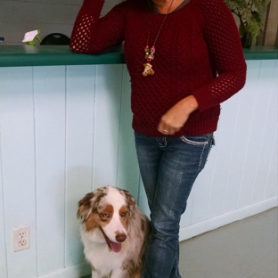 Playcare Pets - Grand Junction, CO. Owner Stacy with a fur buddy!