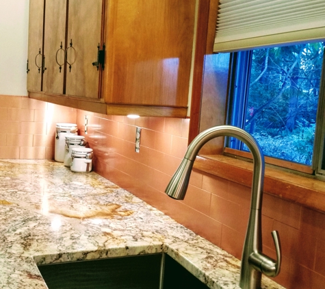 Lowe's Home Improvement - Tigard, OR. The new Kraus kitchen farm sink is fabulous! with Galaxy Stoneworks granite!