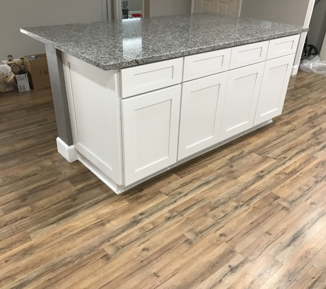 Selective Cabinets & Granite