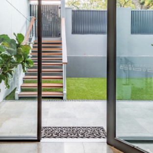 Bradnam's Windows & Doors - Bungalow, QLD. Black Aluminium Hinged Door