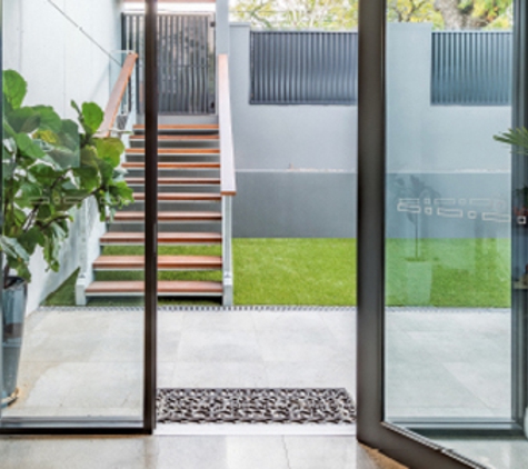 Bradnam's Windows & Doors - Ashmore, QLD. Black Aluminium Hinged Door
