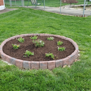 Frada Landcaping LLC - newark, DE. New flower bed with mulch installation