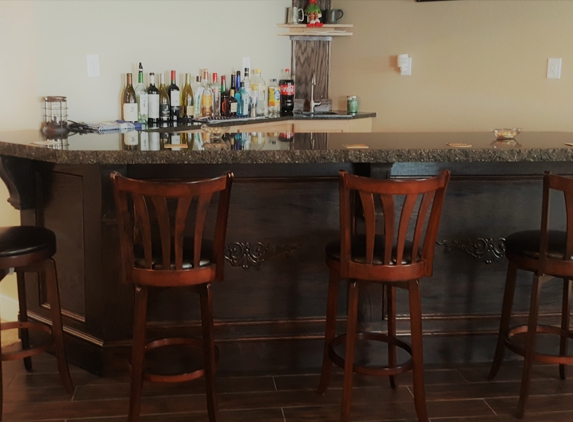 Old England Builders LLC - Brighton, CO. Basement - hand made Oak bar