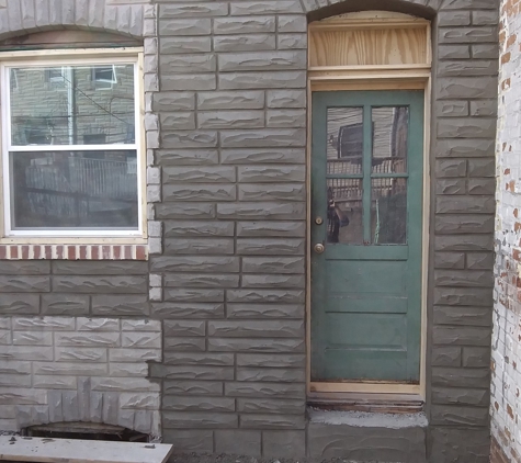 Herb's Formstone and Stucco Company - Glen Burnie, MD. After - new Formstone application on rowhome in Baltimore