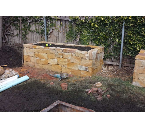 Pave The Way Landscaping - Tighes Hill, NSW. Sandstone garden bed