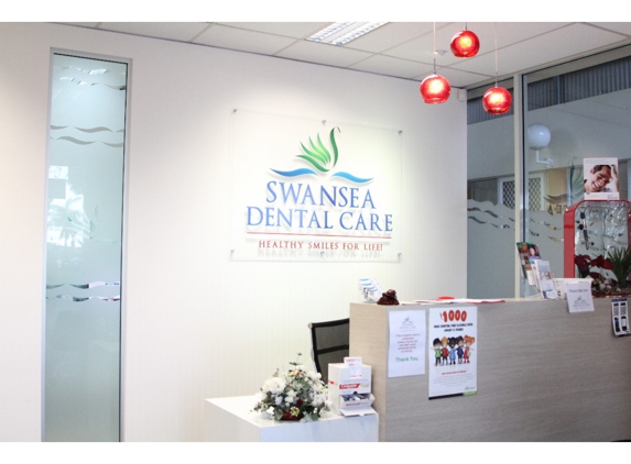 Dentist For Chickens - Swansea Dental Care - Blacksmiths, NSW