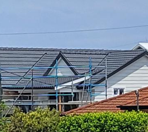 Total Roof Restoration - East Corrimal, NSW. New roof in dulux monument