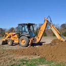 Peek Backhoe & Septic - Excavating Equipment