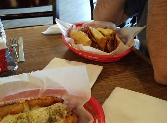 Capo's Pizza - San Antonio, TX. Meatball and Capos sandwiches : both were yummy.