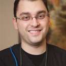 Daniel Kluchman, DDS - Dentists