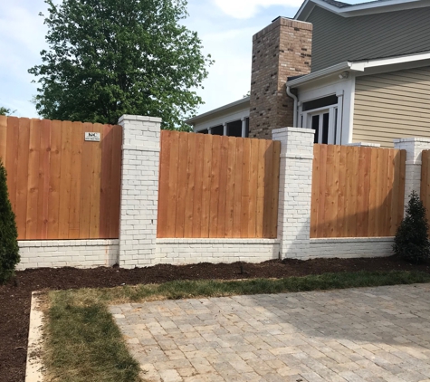 K and C Fence Company - Nashville, TN. 6 foot tall privacy fence between brick columns installed in Nashville Tennessee by K & C Fence Company. http://www.fencenashville.net