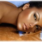 Sunless Beauty Spray Tans by Cristal Crowley