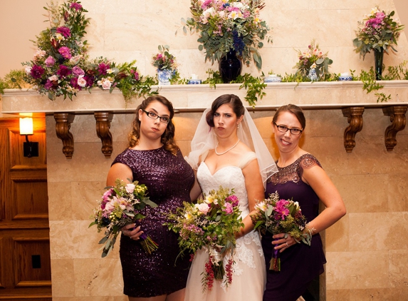 Premier Parties - Mount Holly, NJ. When the ceremony was moved inside due to rain, she moved the decorations to the mantle while we were having pictures taken.